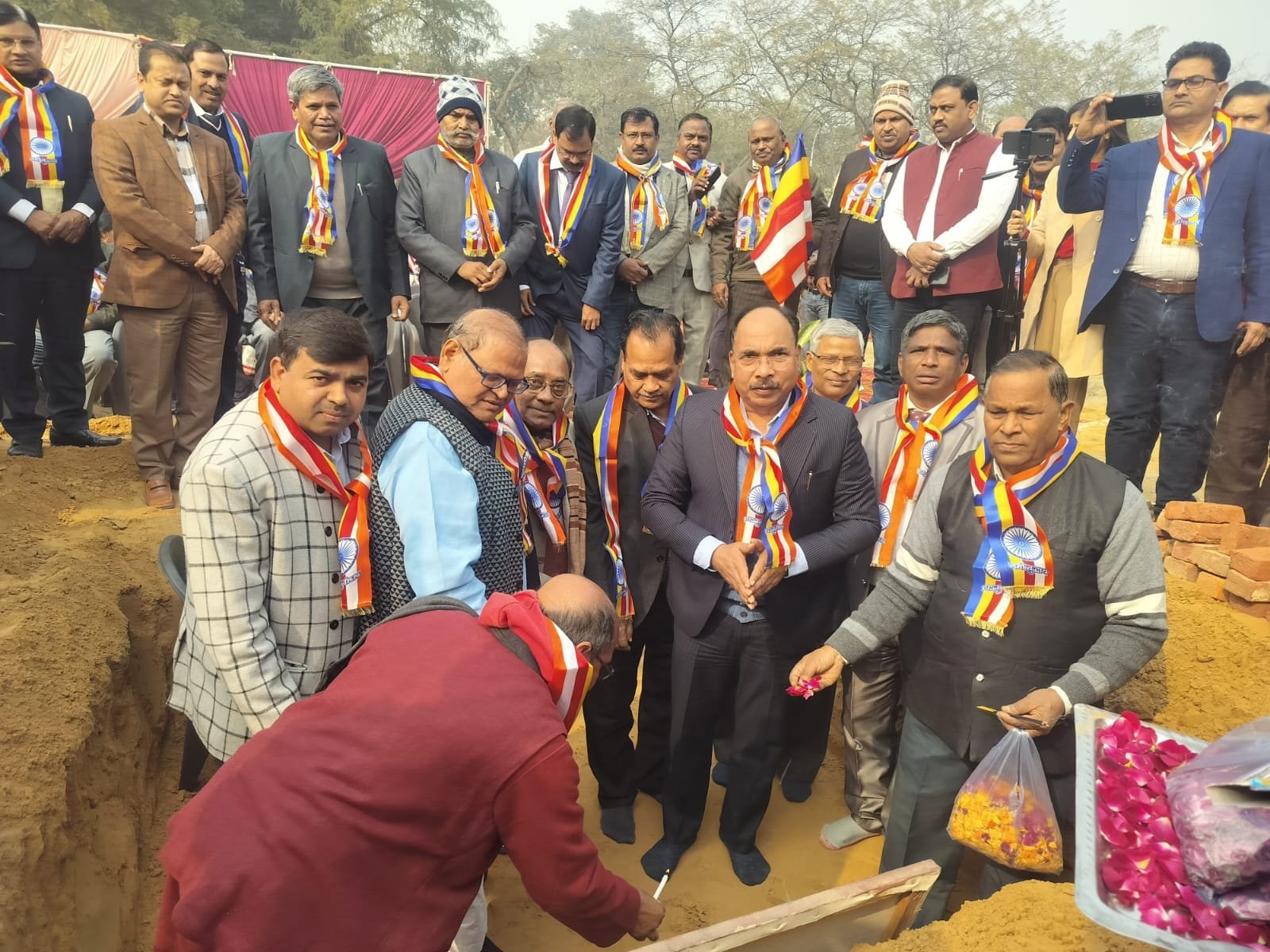 Community members on the Greater Noida land